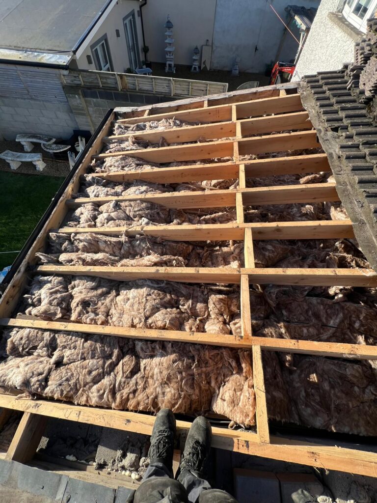 roof insulation between rafters installation.jpg
